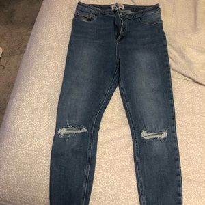 Distressed high waisted super skinny jeans